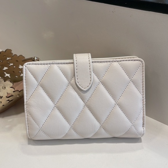 Kate Spade Carey Medium Compartment Bifold Wallet 
COLOR: Parchment - Picture 3 of 16